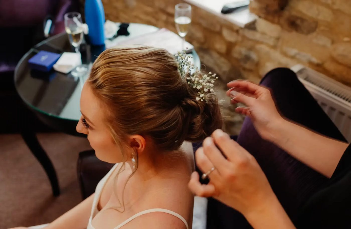 Baby's breath pinned into a bridal updo