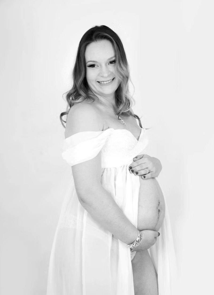 Maternity portrait in a white studio