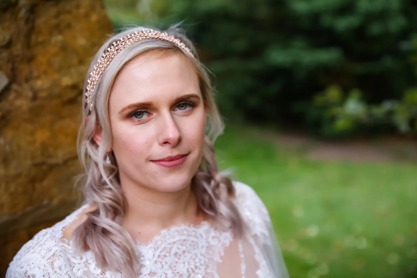 Bride wearing a beaded headband outdoors